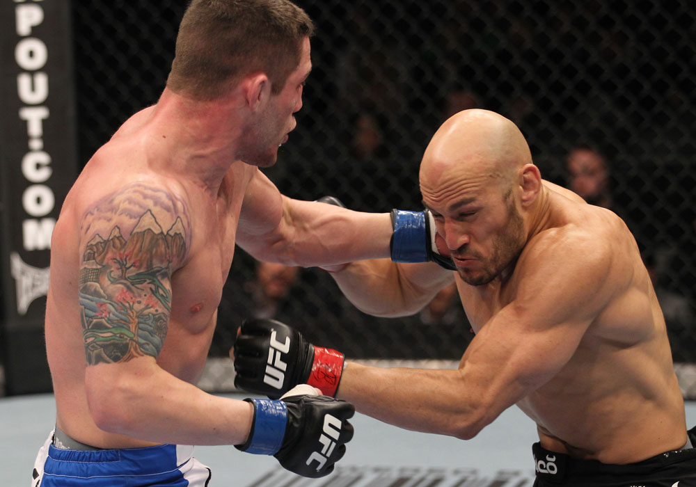 TORONTO, ON - DECEMBER 10:  (L-R) Jake Hecht punches Rich Attonito during the UFC 140 event at Air Canada Centre on December 10, 2011 in Toronto, Ontario, Canada.  (Photo by Nick Laham/Zuffa LLC/Zuffa LLC via Getty Images)