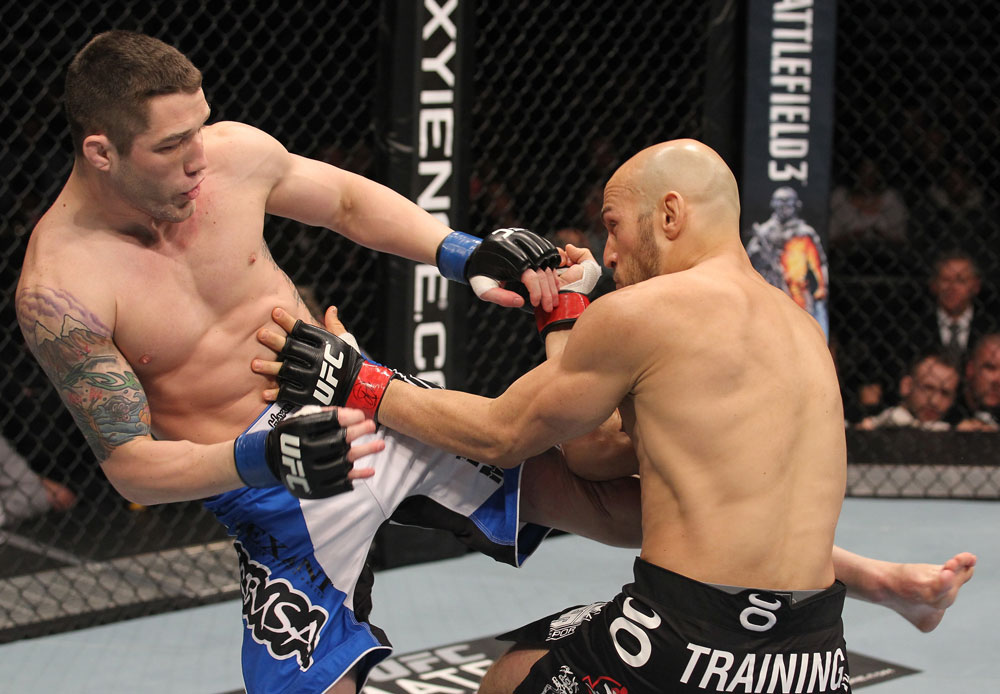TORONTO, ON - DECEMBER 10:  (L-R) Jake Hecht kicks Rich Attonito during the UFC 140 event at Air Canada Centre on December 10, 2011 in Toronto, Ontario, Canada.  (Photo by Nick Laham/Zuffa LLC/Zuffa LLC via Getty Images)