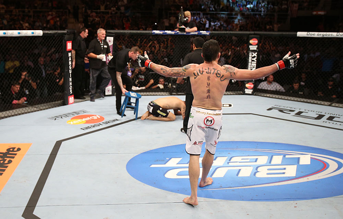RIO DE JANEIRO, BRAZIL - OCTOBER 13:  Rony "Jason" Mariano Bezerra reacts after knocking out Sam Sicilia during their featherweight fight at UFC 153 inside HSBC Arena on October 13, 2012 in Rio de Janeiro, Brazil.  (Photo by Josh Hedges/Zuffa LLC/Zuffa LLC via Getty Images)