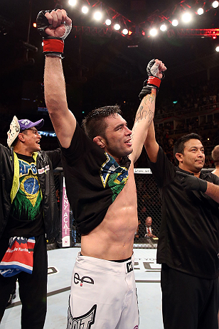 RIO DE JANEIRO, BRAZIL - OCTOBER 13:  Rony "Jason" Mariano Bezerra reacts after knocking out Sam Sicilia during their featherweight fight at UFC 153 inside HSBC Arena on October 13, 2012 in Rio de Janeiro, Brazil.  (Photo by Josh Hedges/Zuffa LLC/Zuffa LLC via Getty Images)