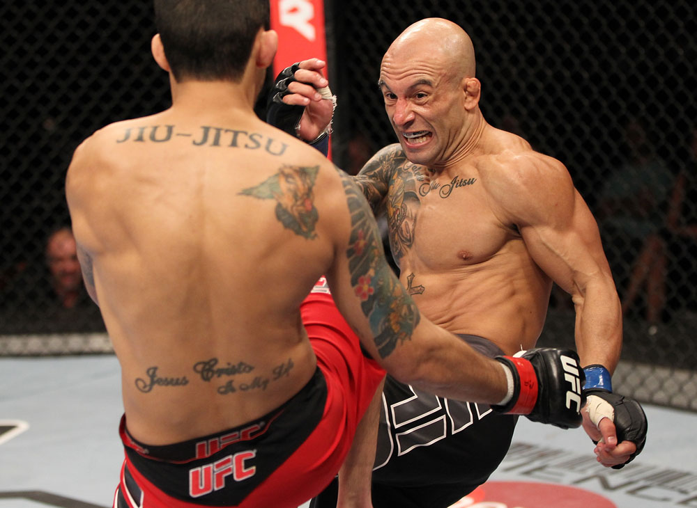 BELO HORIZONTE, BRAZIL - JUNE 23:   (L-R) Wagner "Galeto" Campos kicks Marcos Vinicius "Vina" during their UFC 147 featherweight bout at Estadio Jornalista Felipe Drummond on June 23, 2012 in Belo Horizonte, Brazil.  (Photo by Josh Hedges/Zuffa LLC/Zuffa LLC via Getty Images)