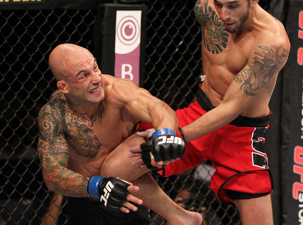 BELO HORIZONTE, BRAZIL - JUNE 23: (L-R) Wagner "Galeto" Campos punches Marcos Vinicius "Vina" during their UFC 147 featherweight bout at Estadio Jornalista Felipe Drummond on June 23, 2012 in Belo Horizonte, Brazil. (Photo by Josh Hedges/Zuffa LLC/Zuffa LLC via Getty Images)