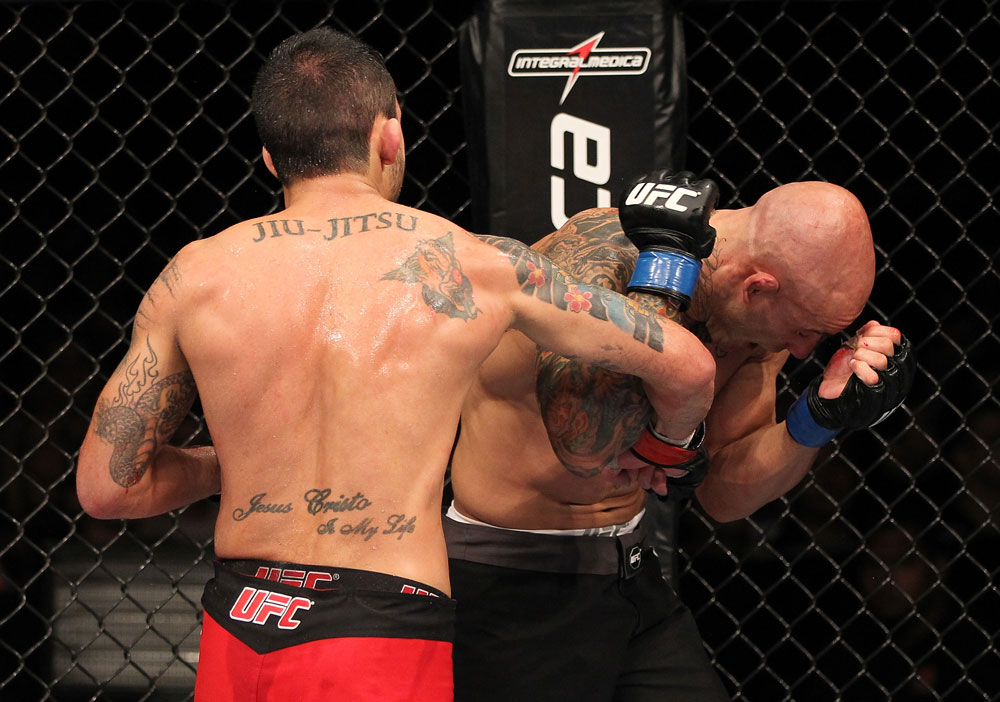 BELO HORIZONTE, BRAZIL - JUNE 23: (L-R) Marcos Vinicius "Vina" punches Wagner "Galeto" Campos during their UFC 147 featherweight bout at Estadio Jornalista Felipe Drummond on June 23, 2012 in Belo Horizonte, Brazil. (Photo by Josh Hedges/Zuffa LLC/Zuffa LLC via Getty Images)