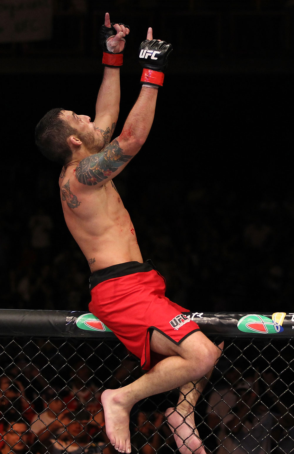 BELO HORIZONTE, BRAZIL - JUNE 23: Marcos Vinicius "Vina" reacts after knocking out Wagner "Galeto" Campos during their UFC 147 featherweight bout at Estadio Jornalista Felipe Drummond on June 23, 2012 in Belo Horizonte, Brazil. (Photo by Josh Hedges/Zuffa LLC/Zuffa LLC via Getty Images)