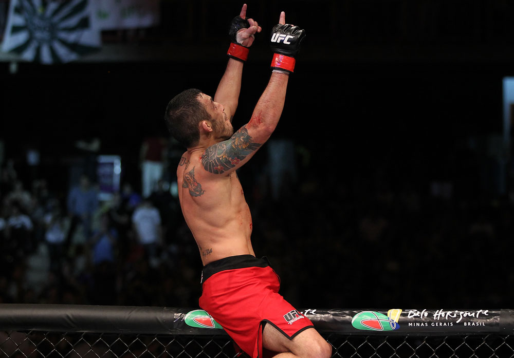 BELO HORIZONTE, BRAZIL - JUNE 23: Marcos Vinicius "Vina" reacts after knocking out Wagner "Galeto" Campos during their UFC 147 featherweight bout at Estadio Jornalista Felipe Drummond on June 23, 2012 in Belo Horizonte, Brazil. (Photo by Josh Hedges/Zuffa LLC/Zuffa LLC via Getty Images)