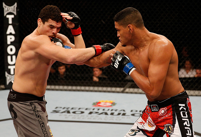 SAO PAULO, BRAZIL - JANUARY 19: (R-L) Ildemar Alcantara punches Wagner Prado in their light heavyweight fight at the UFC on FX event on January 19, 2013 at Ibirapuera Gymnasium in Sao Paulo, Brazil. (Photo by Josh Hedges/Zuffa LLC/Zuffa LLC via Getty Images)