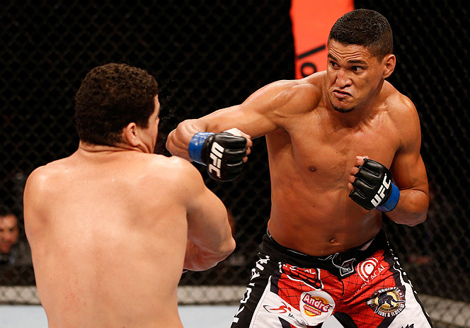 SAO PAULO, BRAZIL - JANUARY 19: (R-L) Ildemar Alcantara punches Wagner Prado in their light heavyweight fight at the UFC on FX event on January 19, 2013 at Ibirapuera Gymnasium in Sao Paulo, Brazil. (Photo by Josh Hedges/Zuffa LLC/Zuffa LLC via Getty Images)