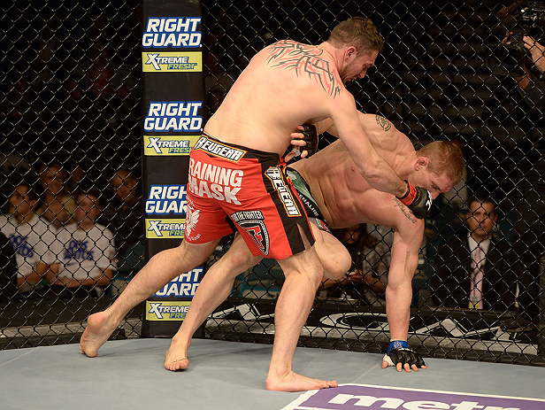 LAS VEGAS, NV - DECEMBER 29:  (L-R) Phil De Fries punches Todd Duffee during their heavyweight fight at UFC 155 on December 29, 2012 at MGM Grand Garden Arena in Las Vegas, Nevada. (Photo by Donald Miralle/Zuffa LLC/Zuffa LLC via Getty Images) *** Local Caption *** Phil De Fries; Todd Duffee