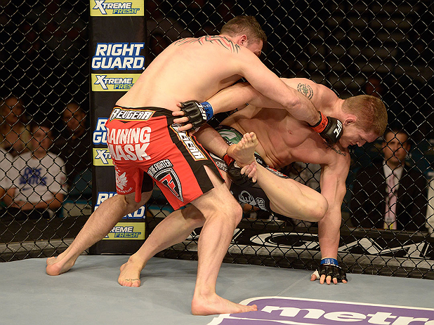 LAS VEGAS, NV - DECEMBER 29:  (L-R) Phil De Fries punches Todd Duffee during their heavyweight fight at UFC 155 on December 29, 2012 at MGM Grand Garden Arena in Las Vegas, Nevada. (Photo by Donald Miralle/Zuffa LLC/Zuffa LLC via Getty Images) *** Local Caption *** Phil De Fries; Todd Duffee