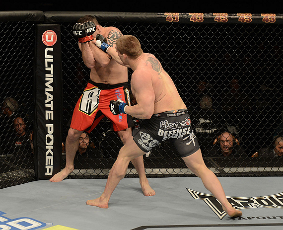 LAS VEGAS, NV - DECEMBER 29:  (R-L) Todd Duffee punches Phil De Fries during their heavyweight fight at UFC 155 on December 29, 2012 at MGM Grand Garden Arena in Las Vegas, Nevada. (Photo by Donald Miralle/Zuffa LLC/Zuffa LLC via Getty Images) *** Local Caption *** Phil De Fries; Todd Duffee