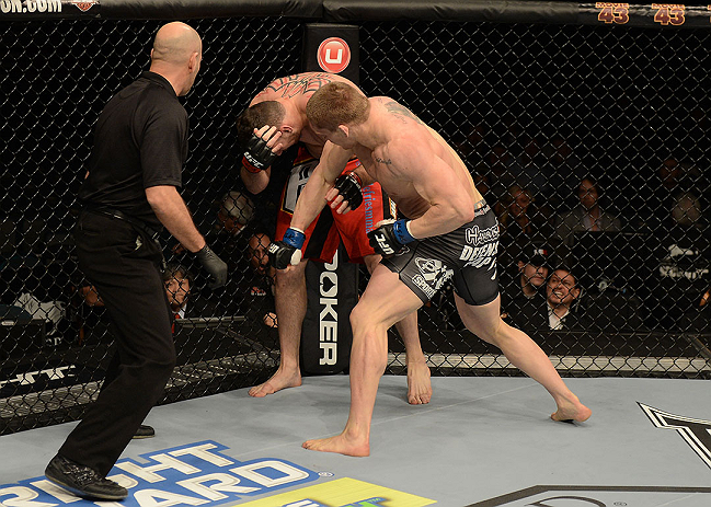 LAS VEGAS, NV - DECEMBER 29:  (R-L) Todd Duffee punches Phil De Fries during their heavyweight fight at UFC 155 on December 29, 2012 at MGM Grand Garden Arena in Las Vegas, Nevada. (Photo by Donald Miralle/Zuffa LLC/Zuffa LLC via Getty Images) *** Local Caption *** Phil De Fries; Todd Duffee