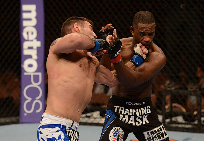 LAS VEGAS, NV - FEBRUARY 02:  (L-R) Isaac Vallie-Flagg punches Yves Edwards during their lightweight fight at UFC 156 on February 2, 2013 at the Mandalay Bay Events Center in Las Vegas, Nevada.  (Photo by Donald Miralle/Zuffa LLC/Zuffa LLC via Getty Images) *** Local Caption *** Yves Edwards; Isaac Vallie-Flagg