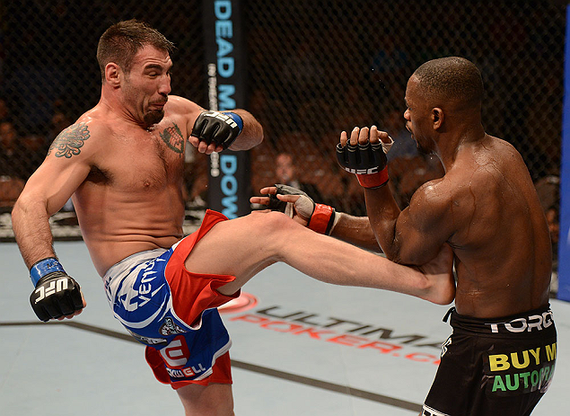 LAS VEGAS, NV - FEBRUARY 02: (L-R) Isaac Vallie-Flagg kicks Yves Edwards during their lightweight fight at UFC 156 on February 2, 2013 at the Mandalay Bay Events Center in Las Vegas, Nevada. (Photo by Donald Miralle/Zuffa LLC/Zuffa LLC via Getty Images) *** Local Caption *** Yves Edwards; Isaac Vallie-Flagg