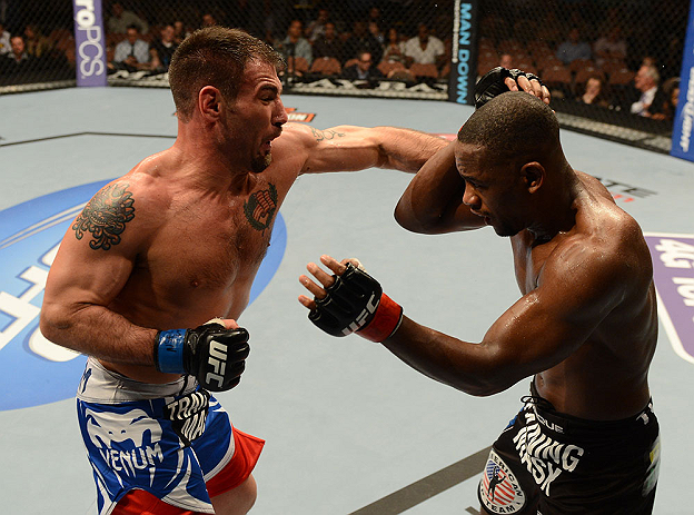 LAS VEGAS, NV - FEBRUARY 02: (L-R) Isaac Vallie-Flagg punches Yves Edwards during their lightweight fight at UFC 156 on February 2, 2013 at the Mandalay Bay Events Center in Las Vegas, Nevada. (Photo by Donald Miralle/Zuffa LLC/Zuffa LLC via Getty Images) *** Local Caption *** Yves Edwards; Isaac Vallie-Flagg