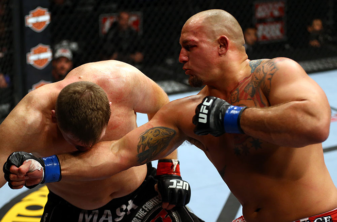 CHICAGO, IL - JANUARY 26:  Shawn Jordan (R) punches Mike Russow (L) during their Heavyweight Bout part of UFC on FOX at United Center on January 26, 2013 in Chicago, Illinois.  (Photo by Al Bello/Zuffa LLC/Zuffa LLC Via Getty Images)