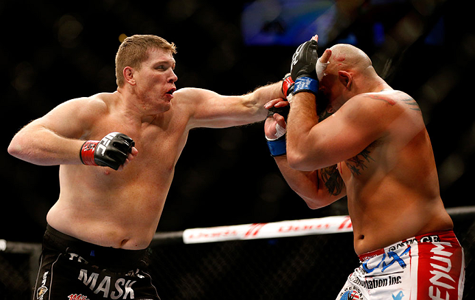 CHICAGO, IL - JANUARY 26:  Shawn Jordan (R) gets punched by Mike Russow (L) during their Heavyweight Bout part of UFC on FOX at United Center on January 26, 2013 in Chicago, Illinois.  (Photo by Josh Hedges/Zuffa LLC/Zuffa LLC Via Getty Images)