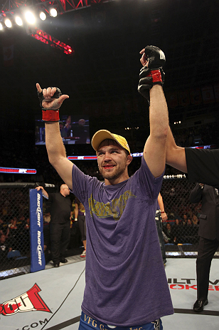 CALGARY, CANADA - JULY 21:  Bryan Caraway celebrates after defeating Mitch Gagnon during their bantamweight bout at UFC 149 inside the Scotiabank Saddledome on July 21, 2012 in Calgary, Alberta, Canada.  (Photo by Nick Laham/Zuffa LLC/Zuffa LLC via Getty Images)