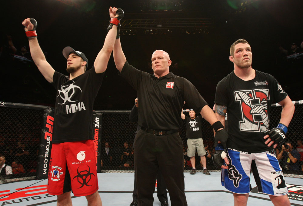 SYDNEY, AUSTRALIA - MARCH 03: TJ Waldburger (L) reacts after defeating Jake Hecht (R) by submission during the UFC on FX event at Allphones Arena on March 3, 2012 in Sydney, Australia. (Photo by Josh Hedges/Zuffa LLC/Zuffa LLC via Getty Images) *** Local Caption *** TJ Waldburger