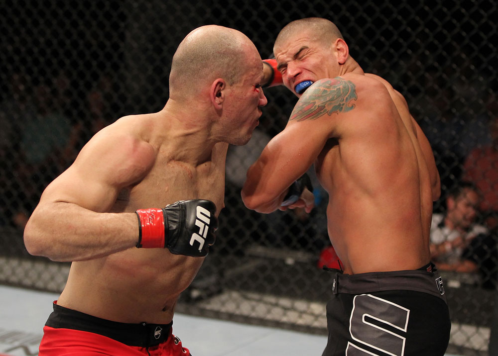 BELO HORIZONTE, BRAZIL - JUNE 23: (L-R) Thiago "Bodao" Perpetuo punches Leonardo Mafra during their UFC 147 middleweight bout at Estadio Jornalista Felipe Drummond on June 23, 2012 in Belo Horizonte, Brazil. (Photo by Josh Hedges/Zuffa LLC/Zuffa LLC via Getty Images)