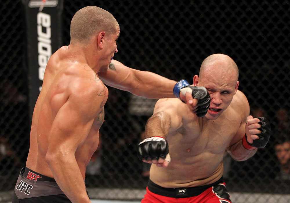 BELO HORIZONTE, BRAZIL - JUNE 23: (L-R) Leonardo Mafra and Thiago "Bodao" Perpetuo exchange punches during their UFC 147 middleweight bout at Estadio Jornalista Felipe Drummond on June 23, 2012 in Belo Horizonte, Brazil. (Photo by Josh Hedges/Zuffa LLC/Zuffa LLC via Getty Images)