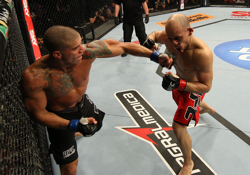 BELO HORIZONTE, BRAZIL - JUNE 23: (L-R) Leonardo Mafra punches Thiago "Bodao" Perpetuo during their UFC 147 middleweight bout at Estadio Jornalista Felipe Drummond on June 23, 2012 in Belo Horizonte, Brazil. (Photo by Josh Hedges/Zuffa LLC/Zuffa LLC via Getty Images)