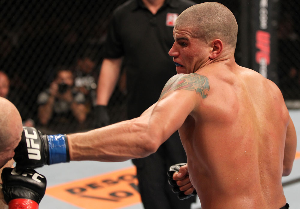 BELO HORIZONTE, BRAZIL - JUNE 23: (R-L) Leonardo Mafra punches Thiago "Bodao" Perpetuo during their UFC 147 middleweight bout at Estadio Jornalista Felipe Drummond on June 23, 2012 in Belo Horizonte, Brazil. (Photo by Josh Hedges/Zuffa LLC/Zuffa LLC via Getty Images)