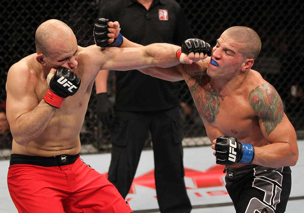 BELO HORIZONTE, BRAZIL - JUNE 23: (R-L) Leonardo Mafra and Thiago "Bodao" Perpetuo exchange punches during their UFC 147 middleweight bout at Estadio Jornalista Felipe Drummond on June 23, 2012 in Belo Horizonte, Brazil. (Photo by Josh Hedges/Zuffa LLC/Zuffa LLC via Getty Images)