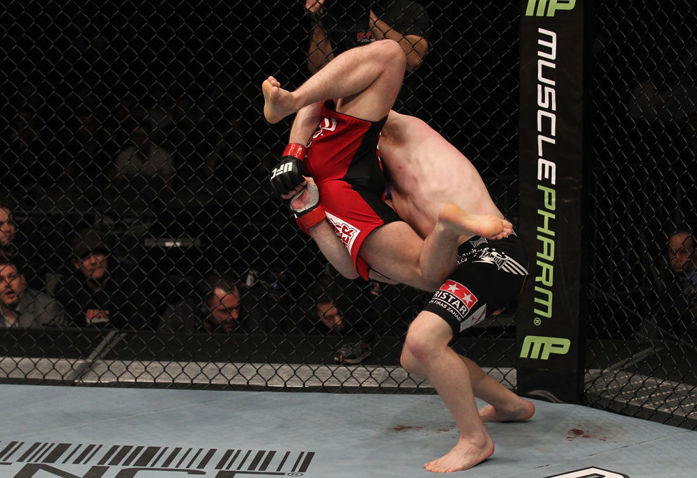 TORONTO, ON - DECEMBER 10:  (R-L) Mark Bocek takes down Nik Lentz during the UFC 140 event at Air Canada Centre on December 10, 2011 in Toronto, Ontario, Canada.  (Photo by Nick Laham/Zuffa LLC/Zuffa LLC via Getty Images)