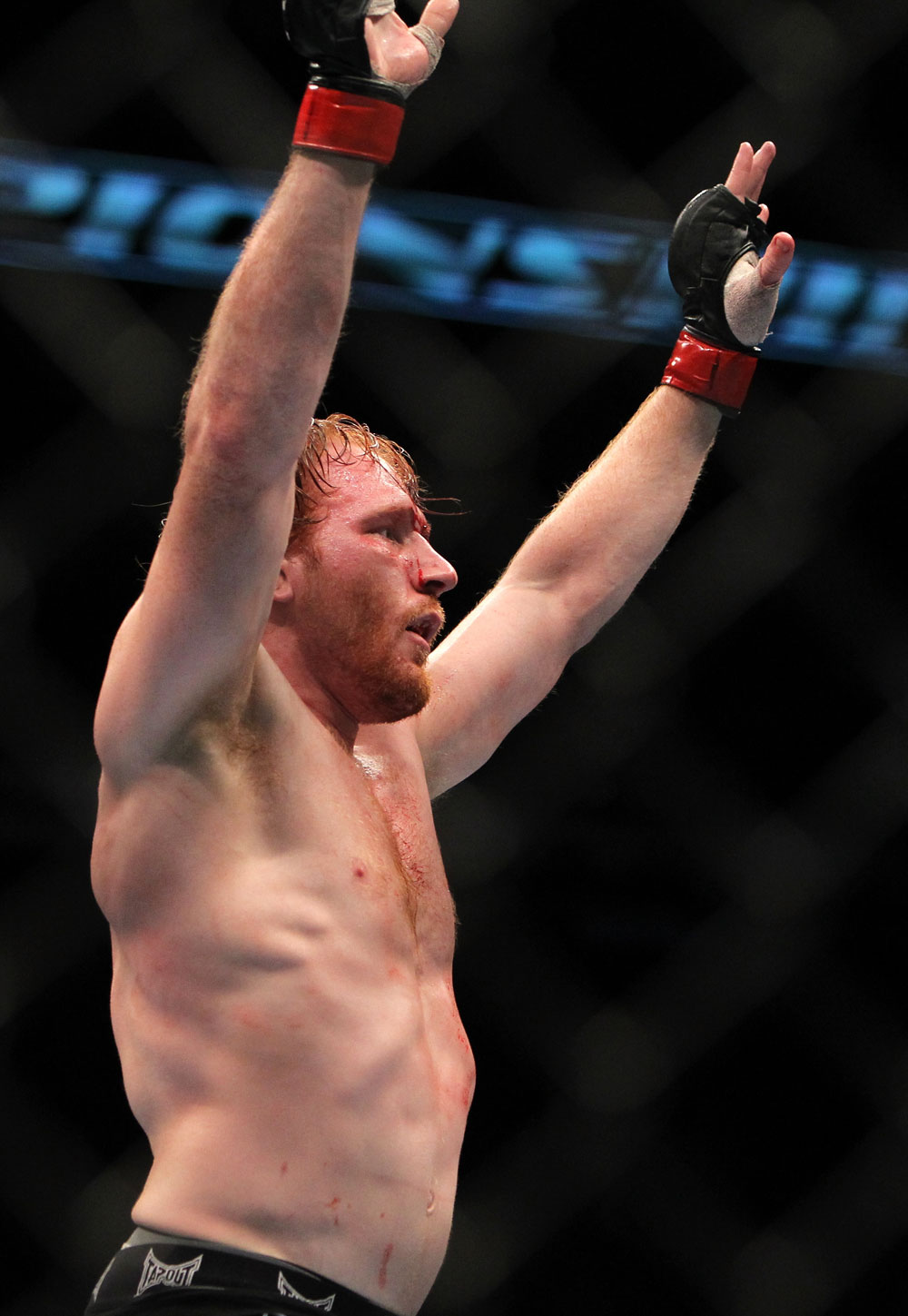 TORONTO, ON - DECEMBER 10:  Mark Bocek reacts after his hard-fought three-round battle against Nik Lentz during the UFC 140 event at Air Canada Centre on December 10, 2011 in Toronto, Ontario, Canada.  (Photo by Josh Hedges/Zuffa LLC/Zuffa LLC via Getty Images)