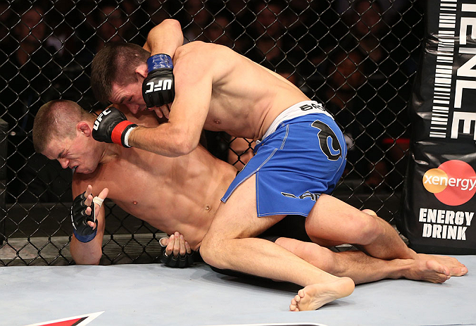 RIO DE JANEIRO, BRAZIL - OCTOBER 13:  (R-L) Demian Maia punches Rick Story during their welterweight fight at UFC 153 inside HSBC Arena on October 13, 2012 in Rio de Janeiro, Brazil.  (Photo by Josh Hedges/Zuffa LLC/Zuffa LLC via Getty Images)