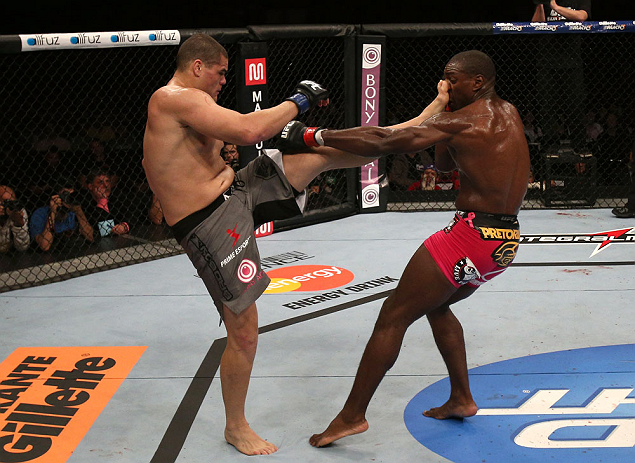 RIO DE JANEIRO, BRAZIL - OCTOBER 13:  (L-R) Wagner Prado kicks Phil Davis during their light heavyweight fight at UFC 153 inside HSBC Arena on October 13, 2012 in Rio de Janeiro, Brazil.  (Photo by Josh Hedges/Zuffa LLC/Zuffa LLC via Getty Images)