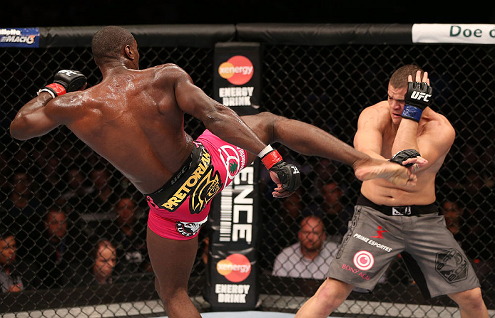 RIO DE JANEIRO, BRAZIL - OCTOBER 13:  (L-R) Phil Davis kicks Wagner Prado during their light heavyweight fight at UFC 153 inside HSBC Arena on October 13, 2012 in Rio de Janeiro, Brazil.  (Photo by Josh Hedges/Zuffa LLC/Zuffa LLC via Getty Images)