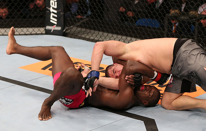 RIO DE JANEIRO, BRAZIL - OCTOBER 13:  (L-R) Phil Davis secures an anaconda choke submission against Wagner Prado during their light heavyweight fight at UFC 153 inside HSBC Arena on October 13, 2012 in Rio de Janeiro, Brazil.  (Photo by Josh Hedges/Zuffa LLC/Zuffa LLC via Getty Images)