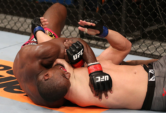 RIO DE JANEIRO, BRAZIL - OCTOBER 13:  (L-R) Phil Davis secures an anaconda choke submission against Wagner Prado during their light heavyweight fight at UFC 153 inside HSBC Arena on October 13, 2012 in Rio de Janeiro, Brazil.  (Photo by Josh Hedges/Zuffa LLC/Zuffa LLC via Getty Images)