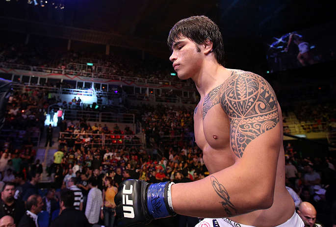 RIO DE JANEIRO, BRAZIL - OCTOBER 13:  Erick Silva enters the Octagon before his welterweight fight against Jon Fitch at UFC 153 inside HSBC Arena on October 13, 2012 in Rio de Janeiro, Brazil.  (Photo by Josh Hedges/Zuffa LLC/Zuffa LLC via Getty Images)