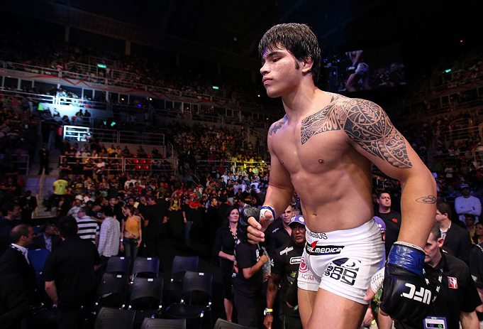 RIO DE JANEIRO, BRAZIL - OCTOBER 13:  Erick Silva enters the Octagon before his welterweight fight against Jon Fitch at UFC 153 inside HSBC Arena on October 13, 2012 in Rio de Janeiro, Brazil.  (Photo by Josh Hedges/Zuffa LLC/Zuffa LLC via Getty Images)