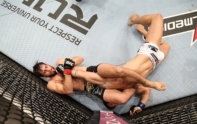 RIO DE JANEIRO, BRAZIL - OCTOBER 13:  (L-R) Jon Fitch attempts to secure an arm bar submission against Erick Silva during their welterweight fight at UFC 153 inside HSBC Arena on October 13, 2012 in Rio de Janeiro, Brazil.  (Photo by Josh Hedges/Zuffa LLC/Zuffa LLC via Getty Images)