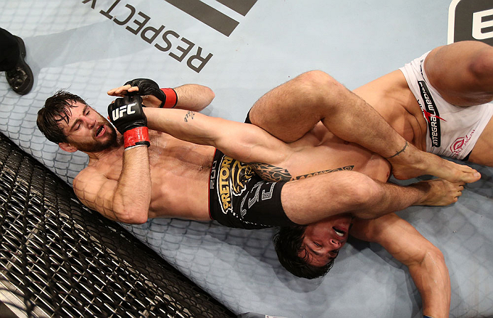 RIO DE JANEIRO, BRAZIL - OCTOBER 13:  (L-R) Jon Fitch attempts to secure an arm bar submission against Erick Silva during their welterweight fight at UFC 153 inside HSBC Arena on October 13, 2012 in Rio de Janeiro, Brazil.  (Photo by Josh Hedges/Zuffa LLC/Zuffa LLC via Getty Images)
