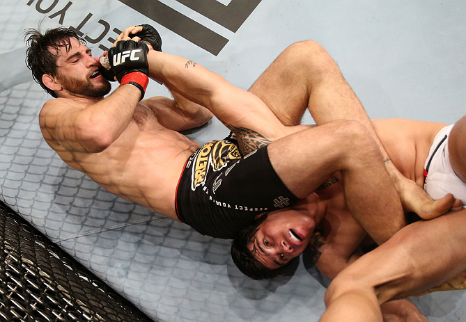 RIO DE JANEIRO, BRAZIL - OCTOBER 13:  (L-R) Jon Fitch attempts to secure an arm bar submission against Erick Silva during their welterweight fight at UFC 153 inside HSBC Arena on October 13, 2012 in Rio de Janeiro, Brazil.  (Photo by Josh Hedges/Zuffa LLC/Zuffa LLC via Getty Images)