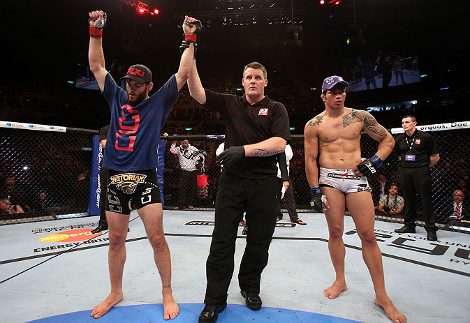 RIO DE JANEIRO, BRAZIL - OCTOBER 13:  Jon Fitch (L) reacts after defeating Erick Silva during their welterweight fight at UFC 153 inside HSBC Arena on October 13, 2012 in Rio de Janeiro, Brazil.  (Photo by Josh Hedges/Zuffa LLC/Zuffa LLC via Getty Images)