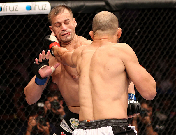 RIO DE JANEIRO, BRAZIL - OCTOBER 13:  (R-L) Glover Teixeira punches Fabio Maldonado during their light heavyweight fight at UFC 153 inside HSBC Arena on October 13, 2012 in Rio de Janeiro, Brazil.  (Photo by Josh Hedges/Zuffa LLC/Zuffa LLC via Getty Images)