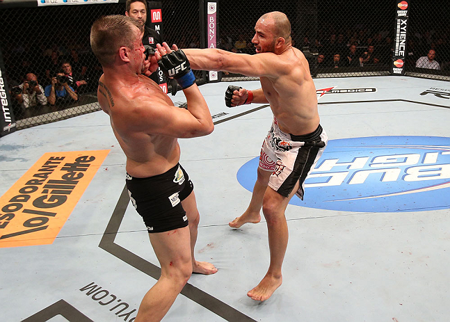 RIO DE JANEIRO, BRAZIL - OCTOBER 13:  (R-L) Glover Teixeira punches Fabio Maldonado during their light heavyweight fight at UFC 153 inside HSBC Arena on October 13, 2012 in Rio de Janeiro, Brazil.  (Photo by Josh Hedges/Zuffa LLC/Zuffa LLC via Getty Images)