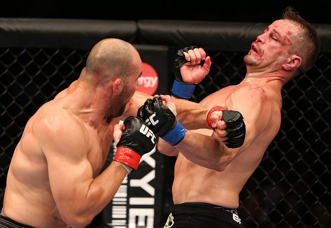 RIO DE JANEIRO, BRAZIL - OCTOBER 13:  (L-R) Glover Teixeira punches Fabio Maldonado during their light heavyweight fight at UFC 153 inside HSBC Arena on October 13, 2012 in Rio de Janeiro, Brazil.  (Photo by Josh Hedges/Zuffa LLC/Zuffa LLC via Getty Images)