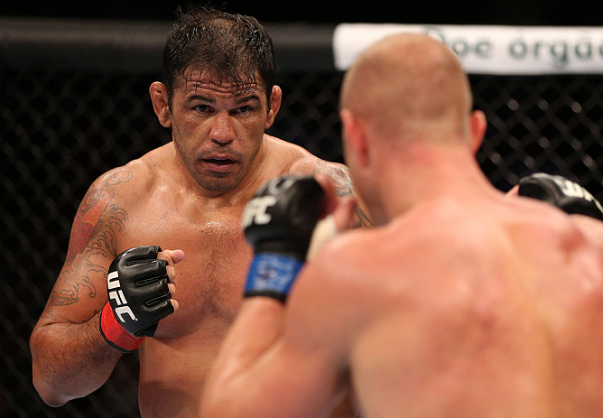 RIO DE JANEIRO, BRAZIL - OCTOBER 13:  (L-R) Antonio Rodrigo "Minotauro" Nogeuira squares off with Dave Herman during their heavyweight fight at UFC 153 inside HSBC Arena on October 13, 2012 in Rio de Janeiro, Brazil.  (Photo by Josh Hedges/Zuffa LLC/Zuffa LLC via Getty Images)