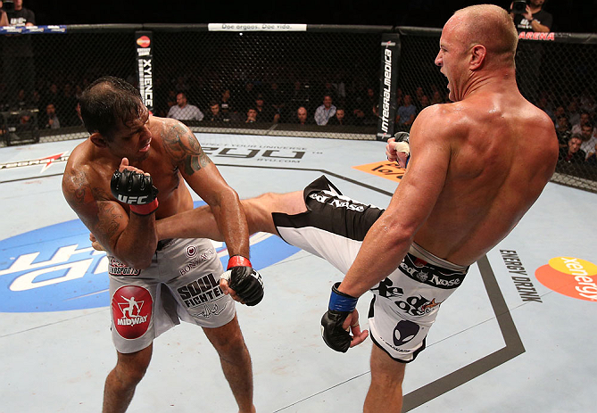 RIO DE JANEIRO, BRAZIL - OCTOBER 13:  (R-L) Dave Herman kicks Antonio Rodrigo "Minotauro" Nogeuira during their heavyweight fight at UFC 153 inside HSBC Arena on October 13, 2012 in Rio de Janeiro, Brazil.  (Photo by Josh Hedges/Zuffa LLC/Zuffa LLC via Getty Images)