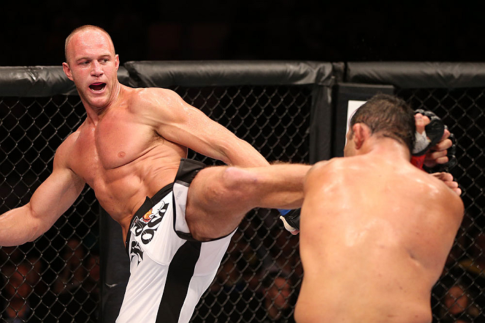 RIO DE JANEIRO, BRAZIL - OCTOBER 13:  (L-R) Dave Herman kicks Antonio Rodrigo "Minotauro" Nogeuira during their heavyweight fight at UFC 153 inside HSBC Arena on October 13, 2012 in Rio de Janeiro, Brazil.  (Photo by Josh Hedges/Zuffa LLC/Zuffa LLC via Getty Images)