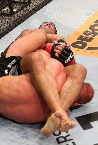 RIO DE JANEIRO, BRAZIL - OCTOBER 13:  Antonio Rodrigo "Minotauro" Nogeuira (top) attempts to secure an arm bar submission against Dave Herman during their heavyweight fight at UFC 153 inside HSBC Arena on October 13, 2012 in Rio de Janeiro, Brazil.  (Photo by Josh Hedges/Zuffa LLC/Zuffa LLC via Getty Images)