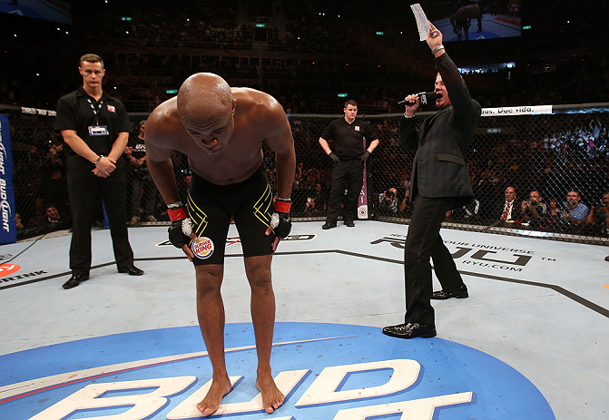RIO DE JANEIRO, BRAZIL - OCTOBER 13:  Anderson Silva (L) is introduced by Bruce Buffer (R) before his light heavyweight fight against Stephan Bonnar at UFC 153 inside HSBC Arena on October 13, 2012 in Rio de Janeiro, Brazil.  (Photo by Josh Hedges/Zuffa LLC/Zuffa LLC via Getty Images)