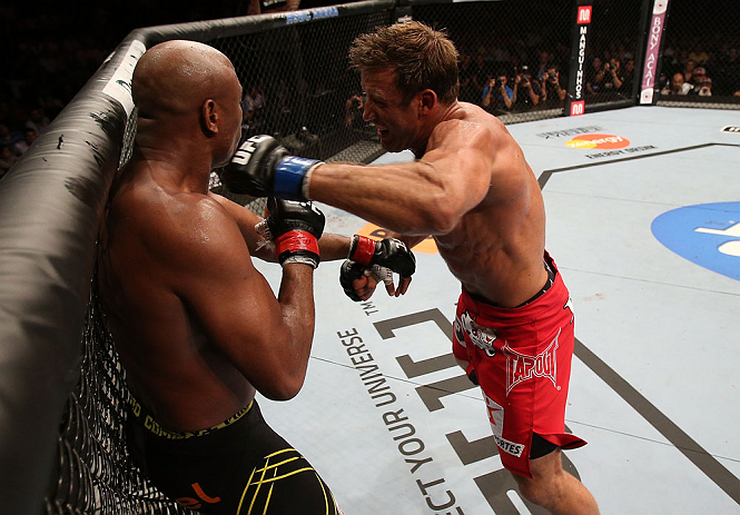 RIO DE JANEIRO, BRAZIL - OCTOBER 13:  (R-L) Stephan Bonnar punches Anderson Silva during their light heavyweight fight at UFC 153 inside HSBC Arena on October 13, 2012 in Rio de Janeiro, Brazil.  (Photo by Josh Hedges/Zuffa LLC/Zuffa LLC via Getty Images)