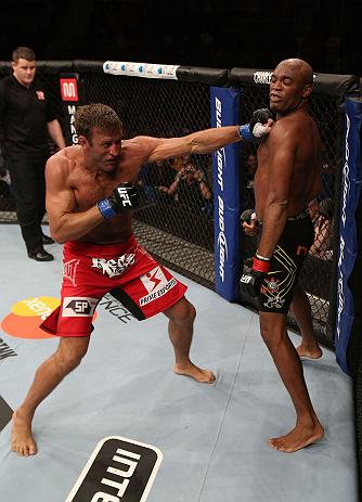 RIO DE JANEIRO, BRAZIL - OCTOBER 13:  (L-R) Stephan Bonnar punches Anderson Silva during their light heavyweight fight at UFC 153 inside HSBC Arena on October 13, 2012 in Rio de Janeiro, Brazil.  (Photo by Josh Hedges/Zuffa LLC/Zuffa LLC via Getty Images)